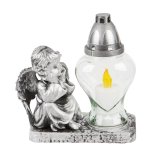 Statua anđeo s lamp.